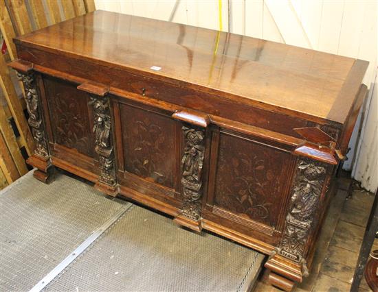 Carved oak panelled chest